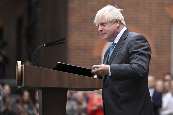 Outgoing British Prime Minister Boris Johnson pauses as he speaks, outside Downing Street in London, Tuesday, Sept. 6, 2022, before heading to Balmoral in Scotland, where he will announce his resignat ...