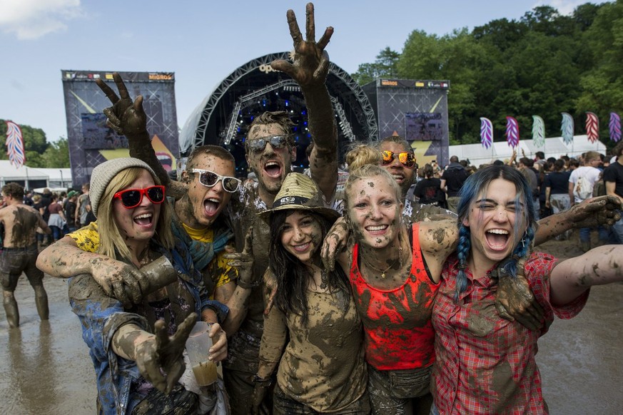 Festivalvisitors dancing in the mud during the OpenAir St. Gallen on Sunday, June 30, 2013, in St. Gallen. The OpenAir St.Gallen is one of the oldest outdoor festivals in Switzerland. It&#039;s close  ...