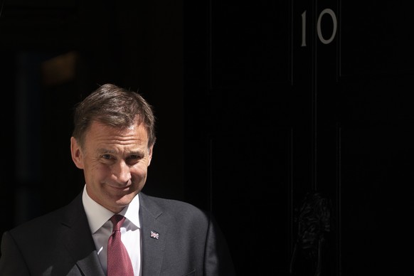 epa07735022 Foreign Secretary Jeremy Hunt leaves after a cabinet meeting in 10 Downing Street, Central London, Britain, 23 July 2019. The conclusion of the Conservative party leadership contest betwee ...