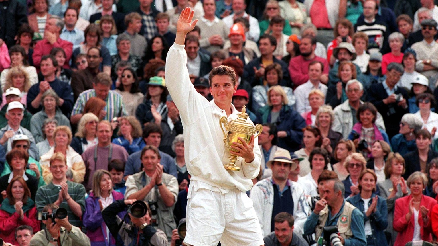 WIMBLEDON MEN S FINAL 1996. RICHARD KRAJICEK CELEBRATES HIS WIN AGAINST MAL WASHINGTON. PHOTO: GLYN KIRK/ ACTION PLUS...1996.tennis.Celebrations .Joy.celebrate.celebration.celebrating.cup cups .trophy ...