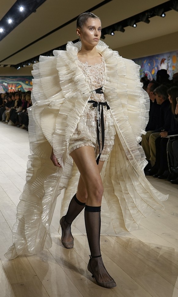 A model wears a creation as part of the Christian Dior Haute Couture Spring Summer 2025 collection, that was presented in Paris, Monday, Jan. 27, 2025. (AP Photo/Lewis Joly).
