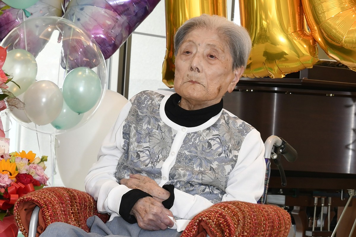 This photo provided by the city of Ashiya shows Tomiko Itooka, being celebrated for her 116th birthday at the nursing home she lives in Ashiya, western Japan, on May 23, 2024. (City of Ashiya via AP)