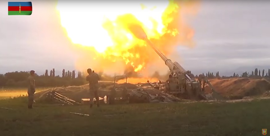 epa08704011 A still image taken from a handout video footage published 28 September 2020 on the official website or the Azerbaijan&#039;s Defence Ministry shows allegedly Azerbaijan&#039;s artillery f ...