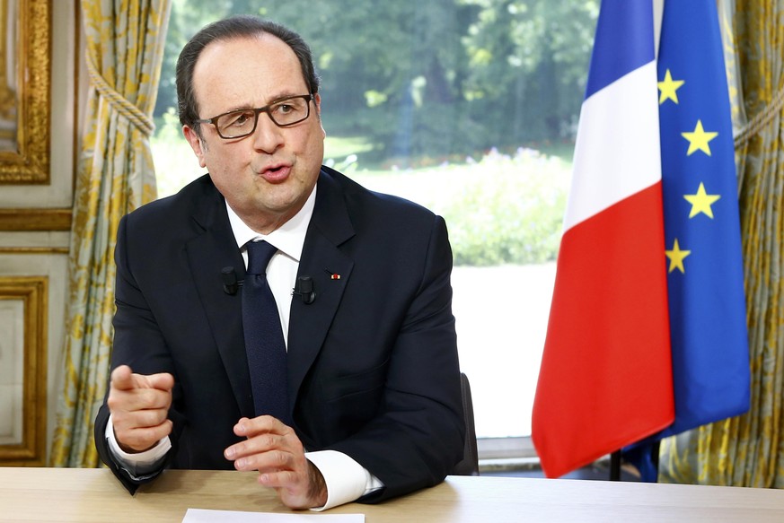 French President Francois Hollande gestures after a televised interview at the Elysee Palace where he said that France will not extend a state of emergency put in place after the November 2015 attacks ...