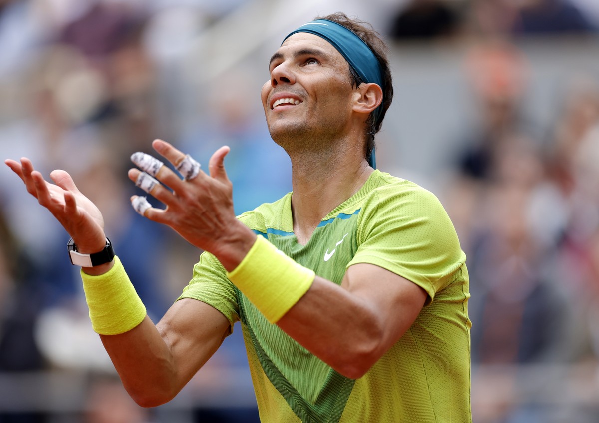 epa09969533 Rafael Nadal of Spain reacts as he plays Jordan Thompson of Australia in their men?s first round match during the French Open tennis tournament at Roland ?Garros in Paris, France, 23 May 2 ...