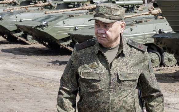 This photo taken and released by Russian Defense Ministry Press Service on Thursday, June 8, 2023, Russian Defense Minister Sergei Shoigu inspects the preparation of equipment and weapons for shipment ...