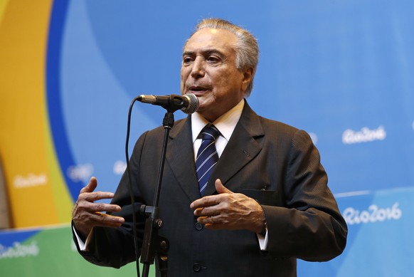 Brazil&#039;s interim President Michel Temer delivers remarks during a briefing at Olympic Park during the 2016 Olympic Games in Rio de Janeiro, Brazil, Thursday, Aug. 18, 2016. (AP Photo/Patrick Sema ...