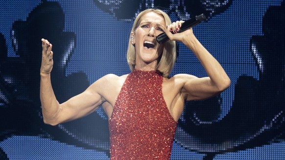FILE - Singer Celine Dion performs during her Courage tour in Quebec City on Sept. 18, 2019. Dion has put a halt on all performing after being diagnosed with a rare neurological disorder. In video mes ...