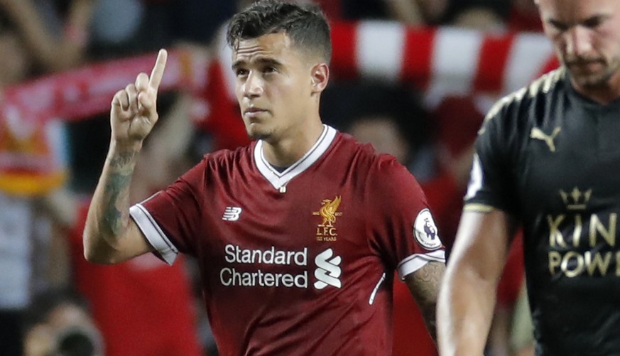 FILE - In this Saturday, July 22, 2017 file photo, Liverpool&#039;s Philippe Coutinho celebrates after scoring a goal during the final match against Leicester City FC at the Premier League Asia Trophy ...