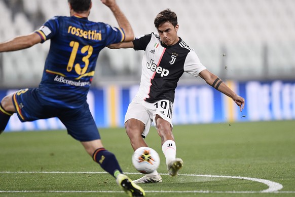 Juventus&#039; Paulo Dybala plays the ball during the Serie A soccer match between Juventus and Lecce, at the Allianz Stadium in Turin, Italy, Friday, June 26, 2020. (Fabio Ferrari/LaPresse via AP)
Pa ...