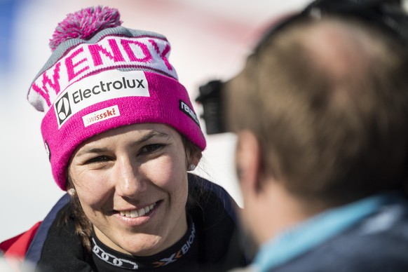 Wendy Holdener of Switzerland is interviewed by a TV journalist in the finish area during the women&#039;s Alpine Combined Slalom race of the Alpine Skiing FIS Ski World Cup in Crans-Montana, Switzerl ...