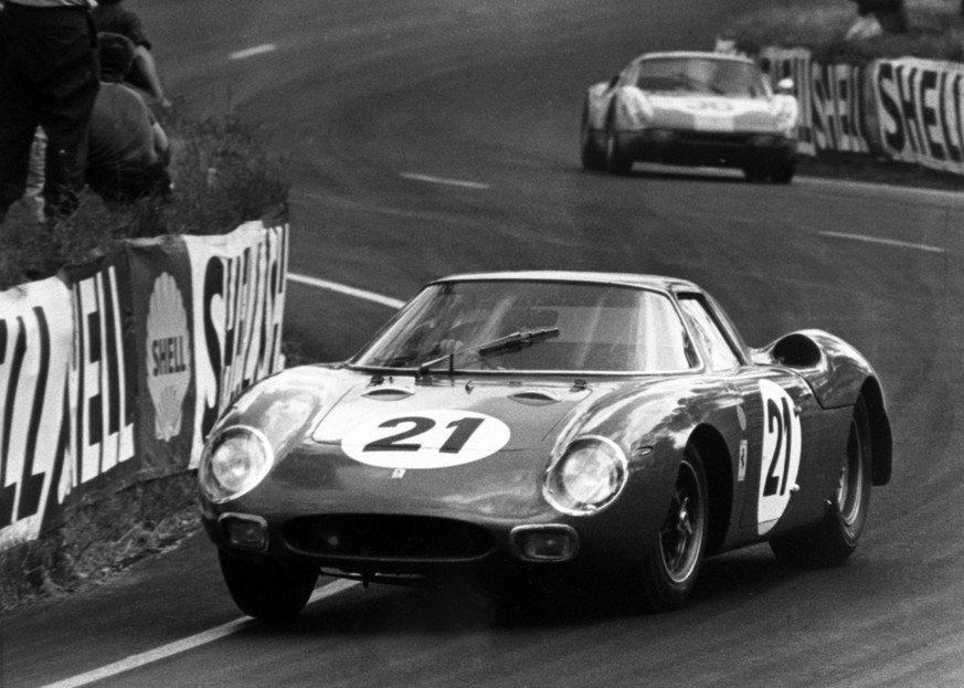 The North American racing team's 3.3 litre, 12 cyclinder, rear-engined Ferrari 250 LM, driven by Masten Gregory of the United States, and Jochen Rindt of Austria, on its way to victory in the 33r ...