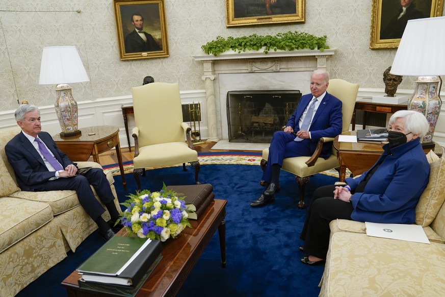 President Joe Biden meets with Treasury Secretary Janet Yellen, right, and Federal Reserve Chairman Jerome Powell in the Oval Office of the White House, Tuesday, May 31, 2022, in Washington. (AP Photo ...