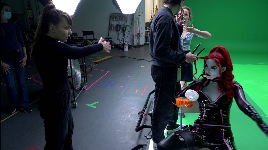 It doesn't work without human dancers.  They have to endure a lot on set - like sweat-resistant makeup and elaborate costumes.