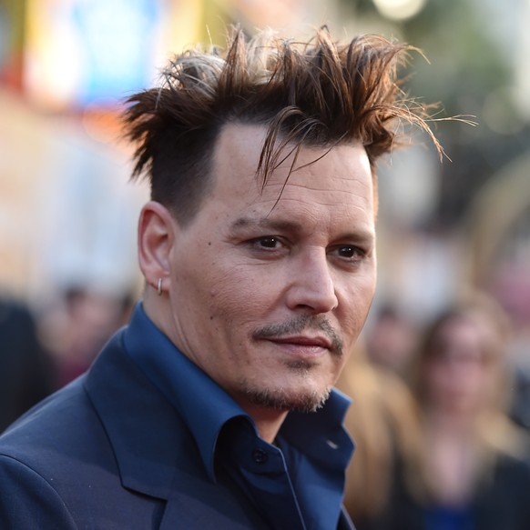 Johnny Depp arrives at the premiere of &quot;Alice Through the Looking Glass&quot; at the El Capitan Theatre on Monday, May 23, 2016, in Los Angeles. (Photo by Jordan Strauss/Invision/AP)