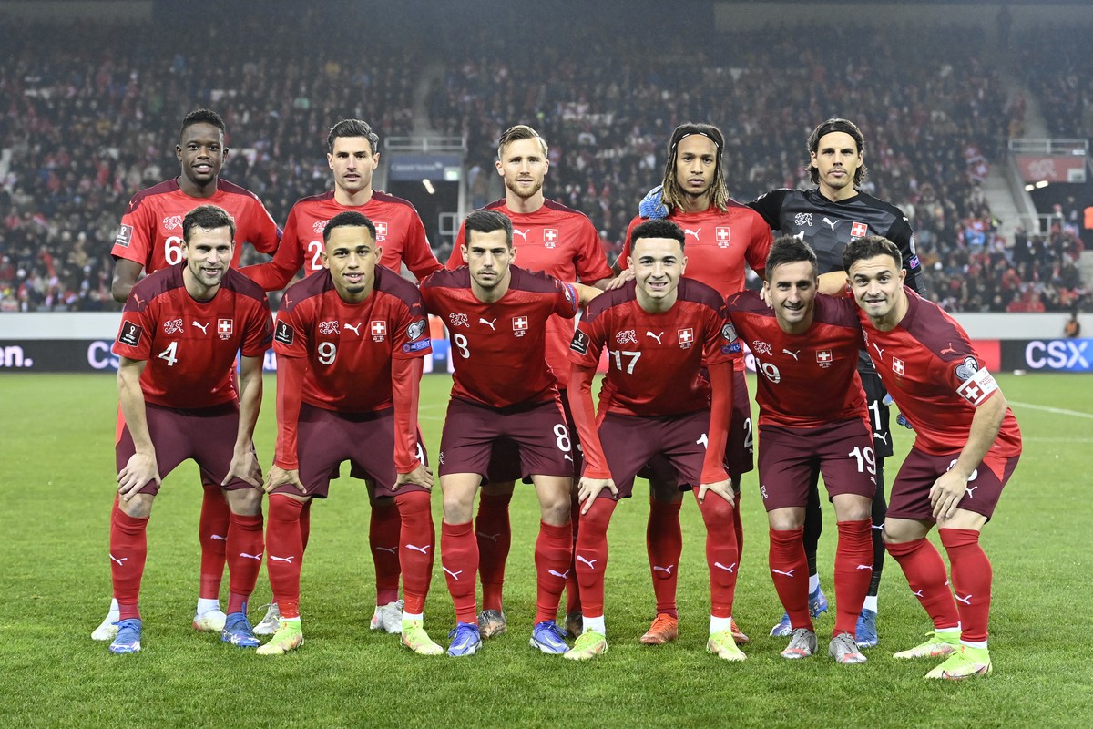 Behind from left, Switzerland's players Switzerland's Denis Zakaria, Fabian Schaer, Silvan Widmer, Kevin Mbabu and goalkeeper Yann Sommer, in front from left, Fabian Frei, Noah Okafor, Remo  ...