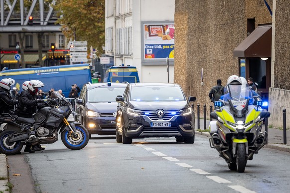 epa12516248 A police convoy escorts the car in which former French President Nicolas Sarkozy leaves La Sante prison after a court decision to release him, in Paris, France, 10 November 2025. A French  ...