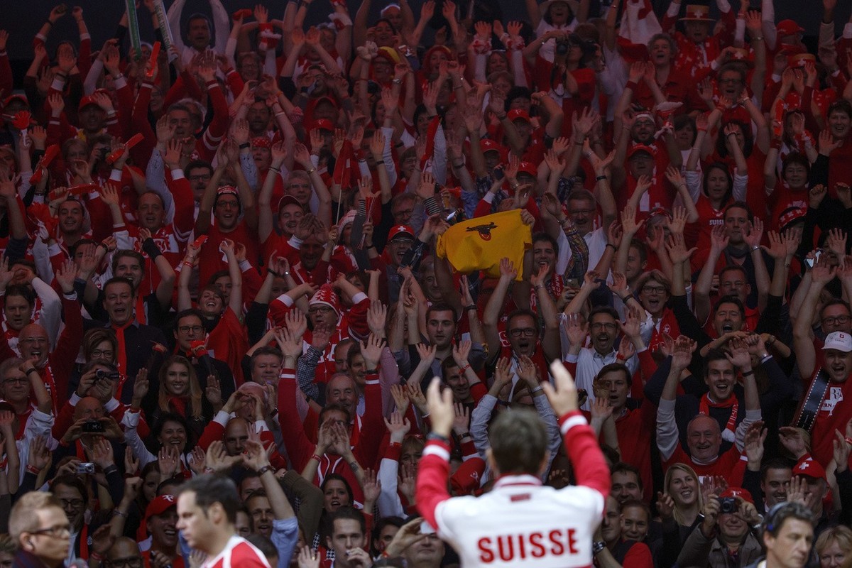 Stanislas Wawrinka cheers his fans after beating French Julien Benneteau and Richard Gasquet, during their doubles match of the Davis Cup Final between France and Switzerland, at the Stadium Pierre Ma ...