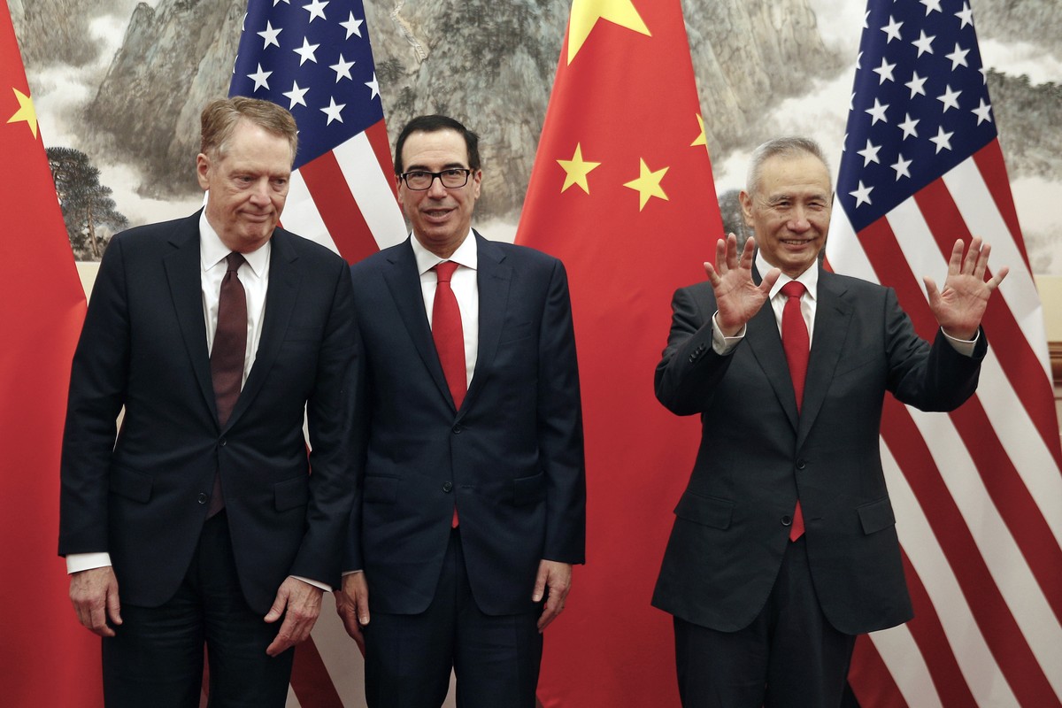 FILE - In this file photo taken Wednesday, May 1, 2019, Chinese Vice Premier Liu He, right, gestures as U.S. Treasury Secretary Steven Mnuchin, center, chats with his Trade Representative Robert Light ...