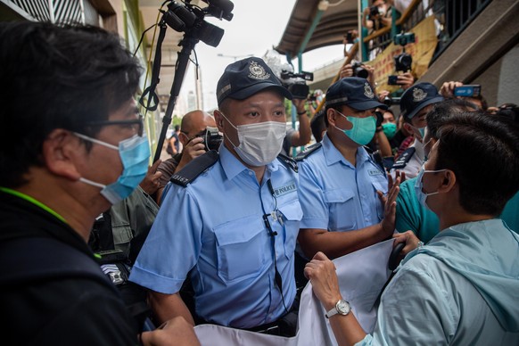 epa08436783 Police block pan-democrat lawmakers and activists from reaching China