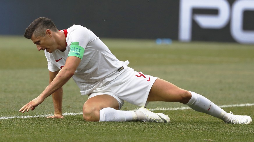 epa06847728 Robert Lewandowski of Poland reacts after missing a goal opportunity during the FIFA World Cup 2018 group H preliminary round soccer match between Japan and Poland in Volgograd, Russia, 28 ...