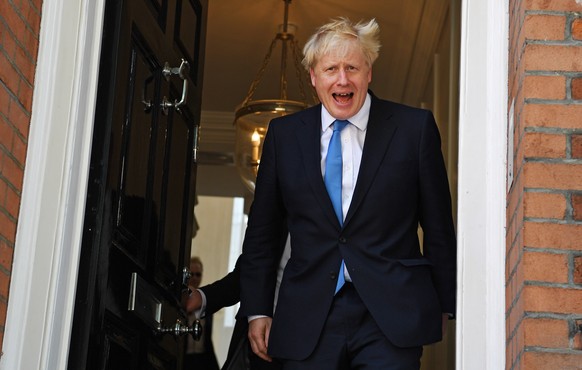 epa07735385 Conservative party leader Boris Johnson departs to his office after he was announced as the new Conservative party leader at an event in London, Britain, 23 July 2019. Former London mayor ...