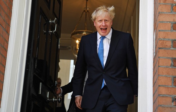 epa07735385 Conservative party leader Boris Johnson departs to his office after he was announced as the new Conservative party leader at an event in London, Britain, 23 July 2019. Former London mayor  ...