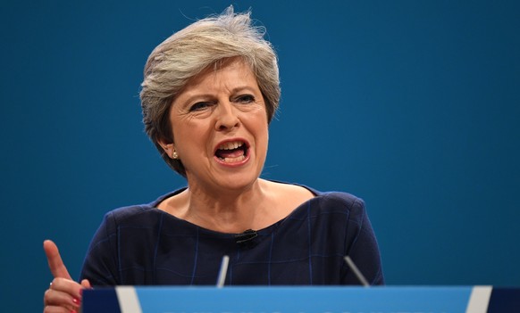 epa06243866 Britain&#039;s Prime Minister Theresa May delivers her speech on the final day of Conservative Party Conference in Manchester, Britain, 04 October 2017. The conference runs from 01 to 04 o ...