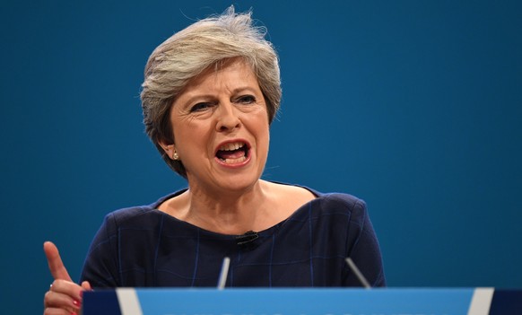 epa06243866 Britain&#039;s Prime Minister Theresa May delivers her speech on the final day of Conservative Party Conference in Manchester, Britain, 04 October 2017. The conference runs from 01 to 04 o ...