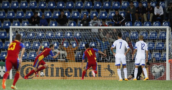 Andorra&#039;s captain Ildefons Lima (L) celebrates a goal against Israel during their Euro 2016 qualification soccer match at Estadi Nacional in Andorra La Vella October 13, 2014. REUTERS/Albert Gea  ...