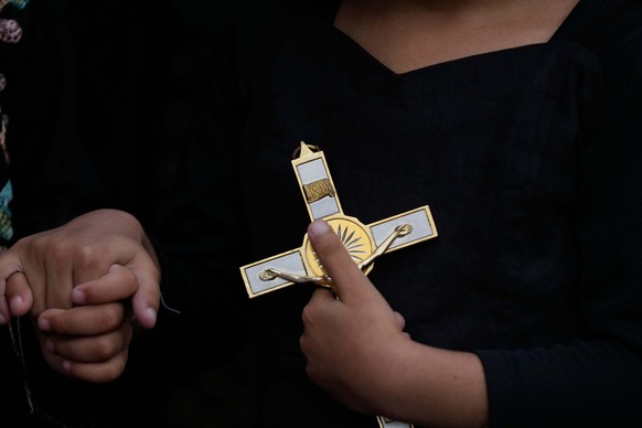 An Indian Christian devotee holds a crucifix during a procession to mark Good Friday in Jammu, India, Friday, April 3, 2026.(AP Photo/Channi Anand)
India Good Friday