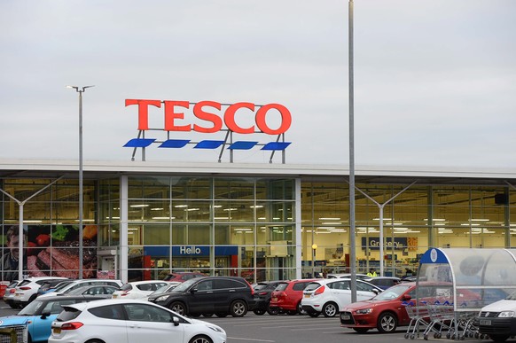 epa10495796 A Tesco supermarket on the Ballygomartin road in Belfast, Northern Ireland, Britain, 28 February 2023. Under the new Windsor Framework it is proposed that supermarkets across Northern Irel ...