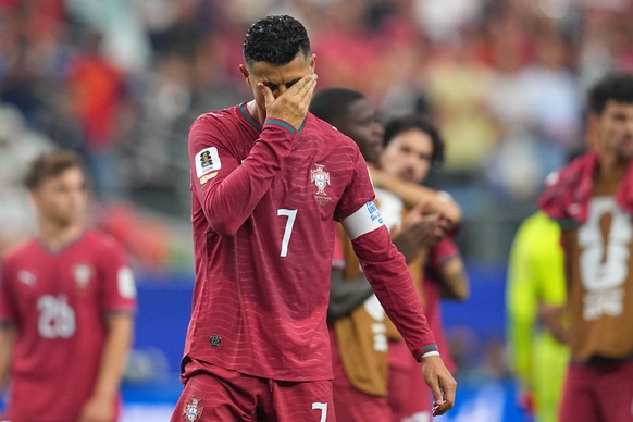 Portugal's Cristiano Ronaldo (7) reacts after the World Cup round of 16 soccer match between Portugal and Spain in Arlington, Texas, near Dallas, Monday, July 6, 2026. (AP Photo/Julio Cortez)
Cri ...