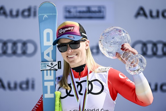 epa11236193 Lara Gut-Behrami of Switzerland celebrates with the women&#039;s super-g overall leader crystal globe trophy on the podium ceremony during the women&#039;s super-g race at the FIS Alpine S ...