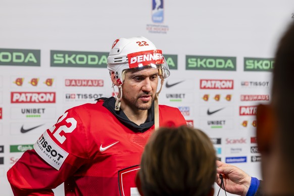 Switzerland&#039;s forward Nino Niederreiter speaks with to media in the mixed zone, after the IIHF 2025 World Championship preliminary round group B game between Switzerland and Kazakhstan, at the Jy ...