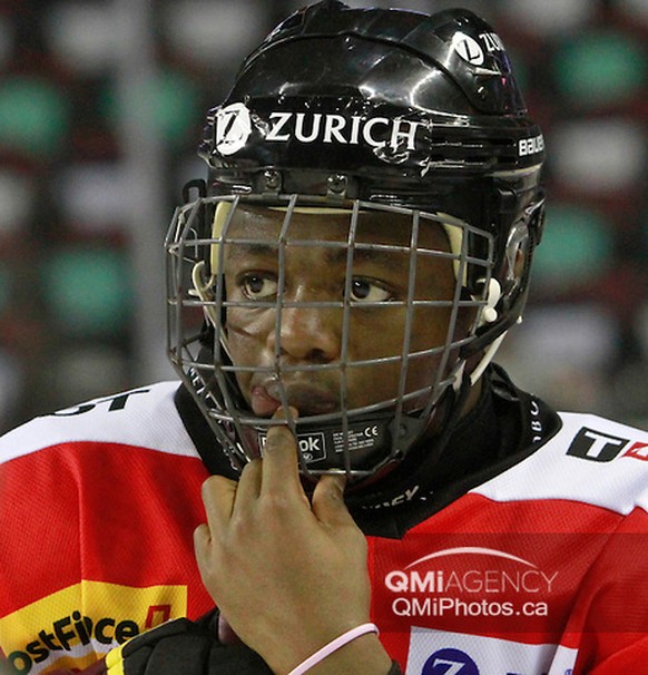 Swiss U17 Auguste Impose gestures as he waits on the blue line, during the trophy presentation, after losing in the final of the Mac&#039;s MIdget AAA hockey tournament in Calgary, Alta. against the F ...