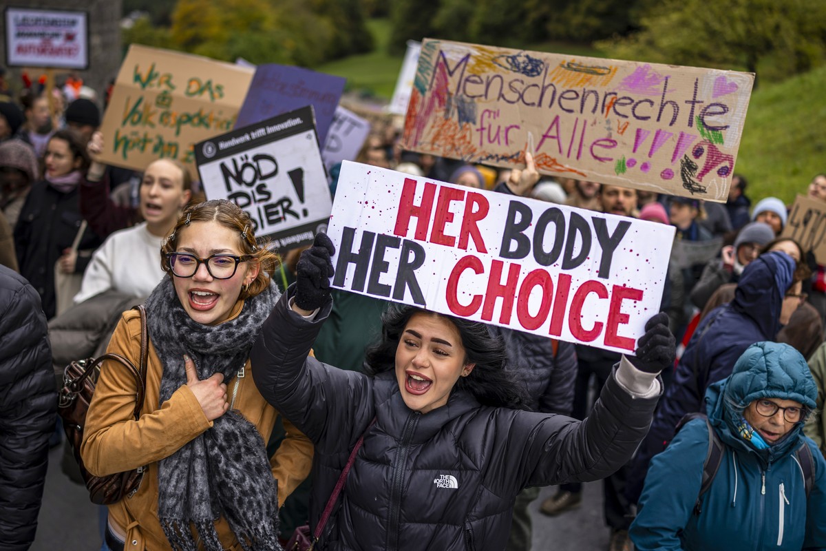 KEYPIX - Women holding placards reading 'Her body her choice' protest during a rally in front of Vaduz Castle against Hereditary Prince Alois's veto of a bill to relax abortion laws on  ...