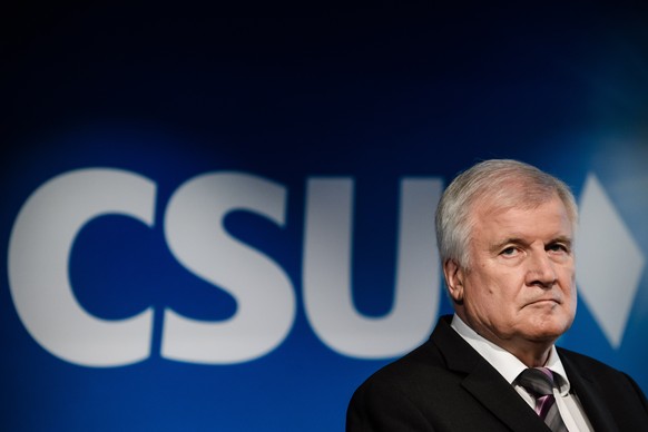 epa07159840 (FILE) - Christian Social Union (CSU) party chairman and German Interior Minister Horst Seehofer speaks during a press conference after a CSU board meeting on the day after the Bavaria sta ...