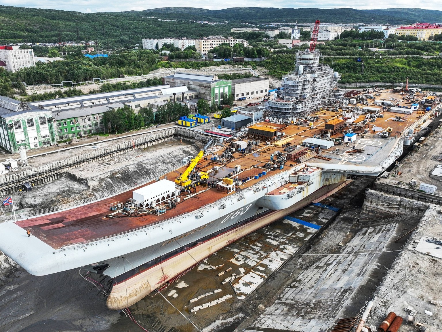 Russia Navy Aircraft Carrier Repairs 8248873 05.08.2022 The Admiral Kuznetsov Aircraft Carrier is docked at the 35th ship-repair plant in Murmansk, Russia. The vessel is undergoing repairs and moderni ...