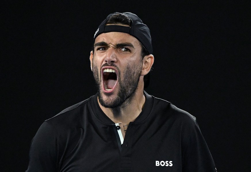 epa09708177 Matteo Berrettini of Italy reacts after winning his Men?s singles quarterfinal match against Gael Monfils of France at the Australian Open Grand Slam tennis tournament at Melbourne Park, i ...