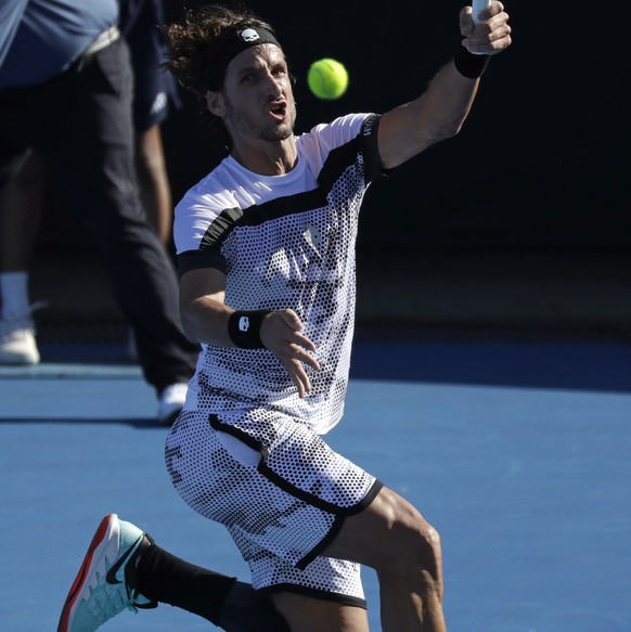 Spain&#039;s Feliciano Lopez hits a forehand return to Australia&#039;s Jordan Thompson during their first round match at the Australian Open tennis championships in Melbourne, Australia, Monday, Jan. ...