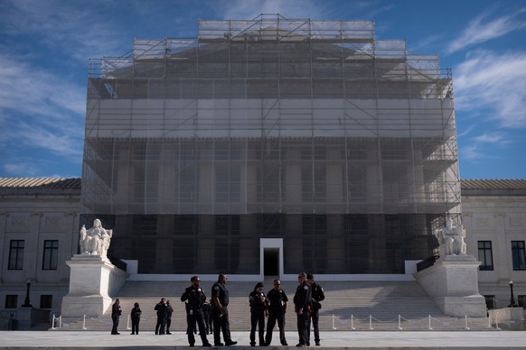 Police officers stand outside the Supreme Court during oral arguments on Wednesday, Nov. 5, 2025, in Washington. (AP Photo/Mark Schiefelbein)
Supreme Court Tariffs