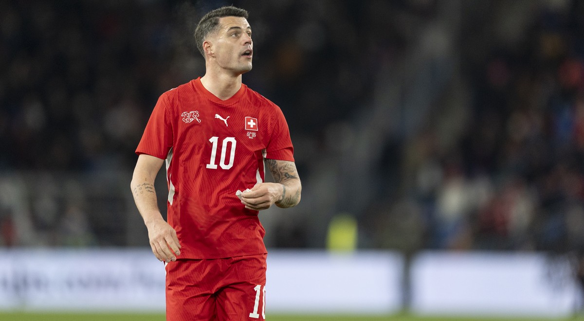 Switzerland's Granit Xhaka reacts at the end of the first half during a friendly soccer match between Switzerland and Germany at the St. Jakob-Park stadium in Basel, Switzerland, on Friday, March ...