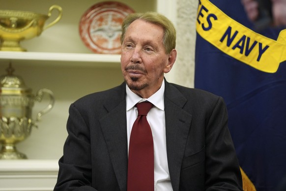Larry Ellison, chairman and chief technology officer of Oracle Corporation, sits in the Oval Office of the White House as President Donald Trump signs an executive order, Monday, Feb. 3, 2025, in Wash ...