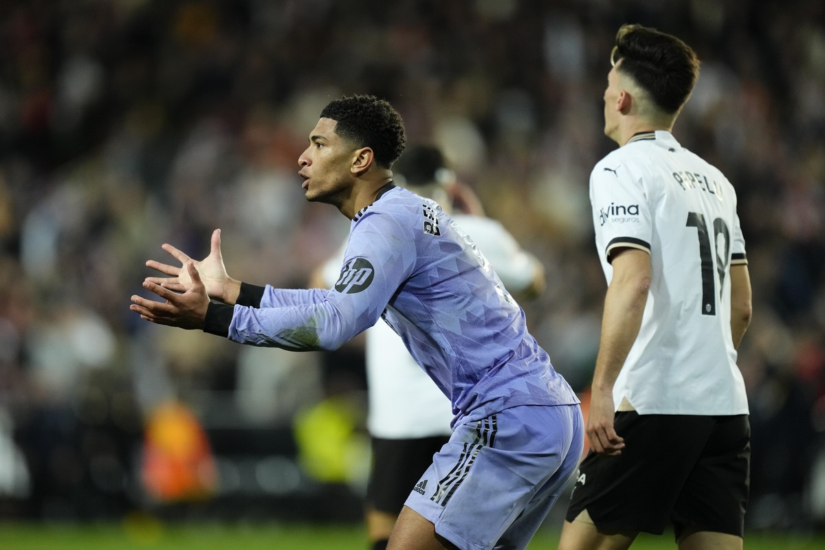 Real Madrid's Jude Bellingham reacts after his goal was disallowed when referee Gil Manzano blew for time during the La Liga soccer match between Valencia and Real Madrid at the Mestalla Stadium  ...