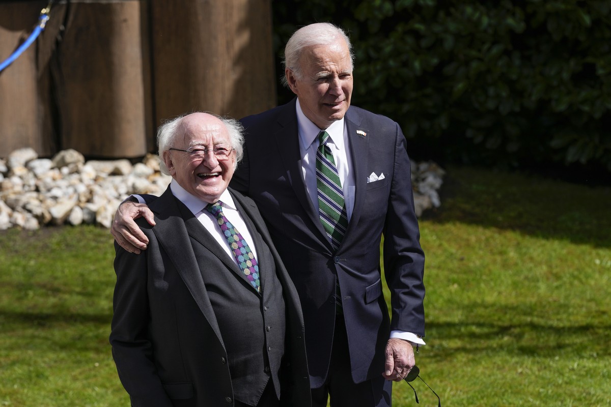 President Joe Biden poses for a photo after ringing the Peace Bell with Irish President Michael Higgins at Aras an Uachtarain, the presidential residence, Thursday, April 13, 2023, in Dublin. (AP Phot ...
