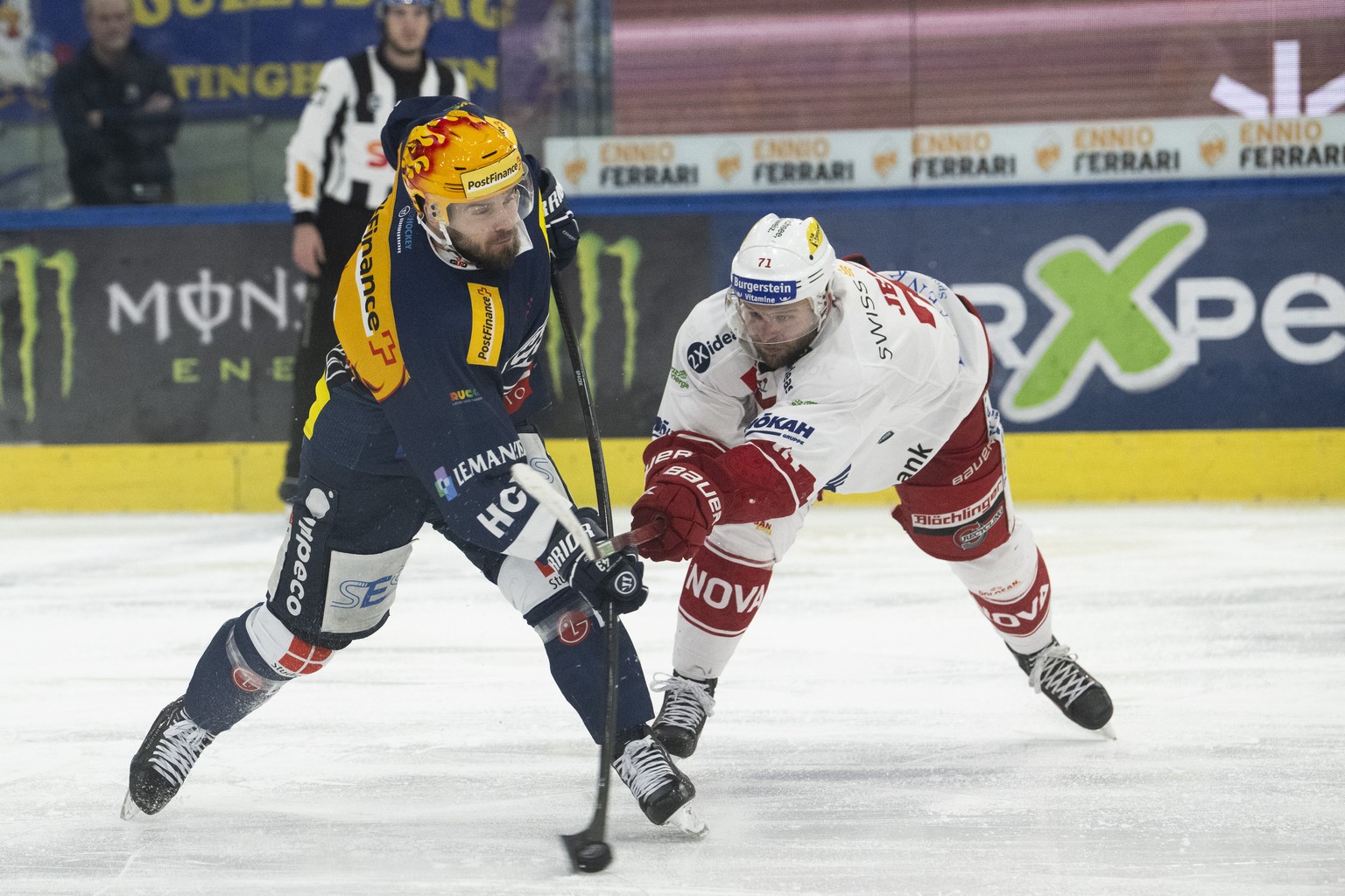From left, Ambri&#039;s player Michael Spacek and Lakers&#039;s player Nicklas Jensen , during the preliminary round game of National League A (NLA) Swiss Championship 2023/24 between HC Ambri Piotta  ...