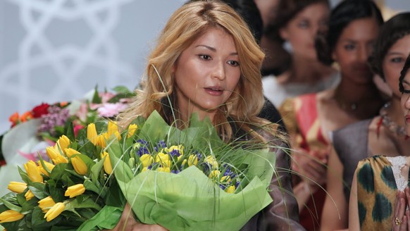 epa04121713 (FILE) A file photo dated 02 April 2011 showing Gulnara Karimova (C), daughter of Uzbek President Uzbek President Islam Karimov, after showing her brand GULI at the Mercedes-Benz Fashion W ...