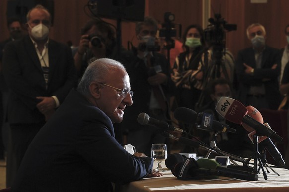 epa08687010 The governor of the Campania region, Vincenzo De Luca (L) attends a press conference during the regional elections in Naples, Italy, 21 September 2020. EPA/CIRO FUSCO