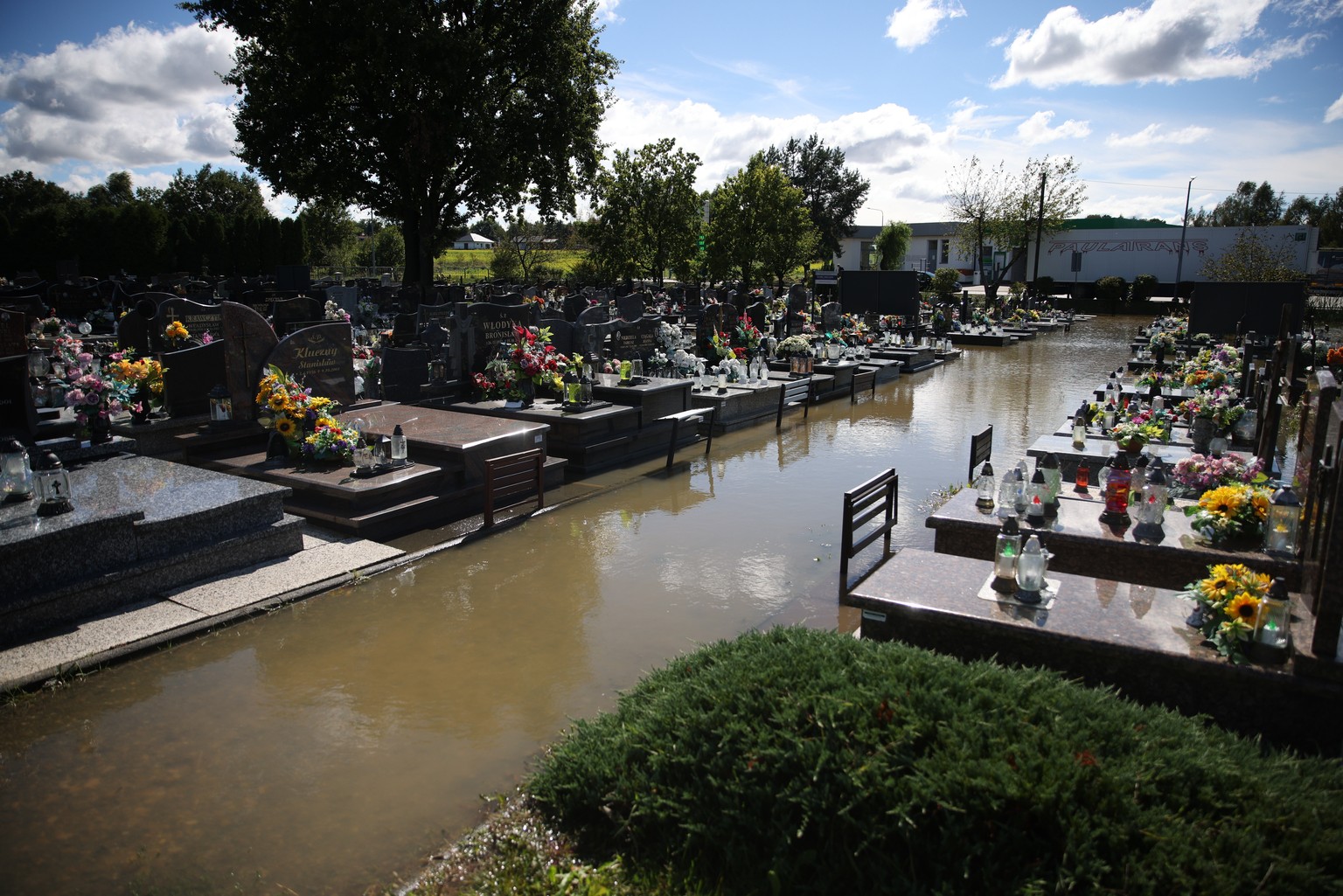 epa11605706 Flooded municipal cemetery after heavy rainfalls in Brzeszcze, southern Poland, 15 September 2024. The southern regions of Poland are experiencing record rainfall and severe flooding cause ...